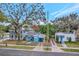 Street view of a charming teal house with a carport at 1300 E Kaley St, Orlando, FL 32806