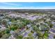 Wide aerial view showing the property and surrounding area at 1300 E Kaley St, Orlando, FL 32806