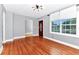 Bright living room featuring hardwood floors and neutral walls at 1300 E Kaley St, Orlando, FL 32806