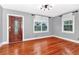 Living room with hardwood floors and lots of natural light at 1300 E Kaley St, Orlando, FL 32806