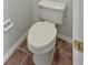 Powder room with toilet and tile flooring at 142 Brushcreek Dr, Sanford, FL 32771