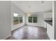 Bright breakfast nook with tile flooring and backyard view at 142 Brushcreek Dr, Sanford, FL 32771