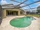 Inviting screened pool area with a spacious patio at 142 Brushcreek Dr, Sanford, FL 32771