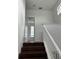 Upstairs hall with view to bedroom and stairs at 14324 Fieldstone Lake Way, Orlando, FL 32824