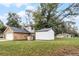 Large backyard with shed and brick home at 1501 Red Oak Ct, Apopka, FL 32703