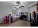 bedroom with a bed, desk and toys at 1501 Red Oak Ct, Apopka, FL 32703