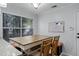 Bright breakfast nook features built-in bench seating and a wood table at 1501 Red Oak Ct, Apopka, FL 32703