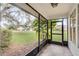 Relaxing screened porch overlooking the backyard at 1501 Red Oak Ct, Apopka, FL 32703