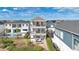 Three-story house with multiple balconies at 1549 Corolla Ct, Reunion, FL 34747