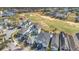 Aerial view of upscale houses near a golf course at 1549 Corolla Ct, Reunion, FL 34747