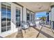 Relaxing balcony with comfortable seating and golf course view at 1549 Corolla Ct, Reunion, FL 34747