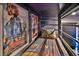 Bunk bed in a themed bedroom with Marvel artwork at 1549 Corolla Ct, Reunion, FL 34747