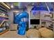 bedroom with a bunk bed, slide, and gaming setup at 1549 Corolla Ct, Reunion, FL 34747