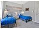 Twin bedroom with Star Wars-themed bedding and headboard at 1549 Corolla Ct, Reunion, FL 34747