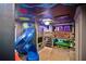 A themed bedroom with a slide and bunk beds, perfect for  at 1549 Corolla Ct, Reunion, FL 34747