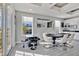 Game room with poker table and arcade game at 1549 Corolla Ct, Reunion, FL 34747