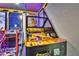 Game room with arcade games, including a basketball game at 1549 Corolla Ct, Reunion, FL 34747