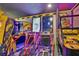 Game room featuring various arcade games and a basketball game at 1549 Corolla Ct, Reunion, FL 34747