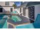 Relaxing hot tub with surrounding lounge chairs at 1549 Corolla Ct, Reunion, FL 34747