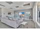 Bright living room with comfy couch and large TV at 1549 Corolla Ct, Reunion, FL 34747