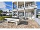 Outdoor patio with pool table, dining area, and grill at 1549 Corolla Ct, Reunion, FL 34747