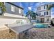 Outdoor ping pong table near the pool at 1549 Corolla Ct, Reunion, FL 34747