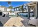 Refreshing pool area with plenty of lounge chairs at 1549 Corolla Ct, Reunion, FL 34747