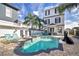 Luxury pool and spa with plenty of seating at 1549 Corolla Ct, Reunion, FL 34747