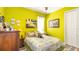 Charming bedroom with a tropical theme and wood dresser at 16036 River Pointe Ct, Orlando, FL 32828