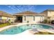 Enjoy this kidney shaped pool with plenty of patio space at 16036 River Pointe Ct, Orlando, FL 32828