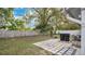 Backyard with patio and grassy area at 1659 Rivers Edge Dr, Orlando, FL 32825