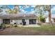 Small backyard with patio and screen enclosure at 1659 Rivers Edge Dr, Orlando, FL 32825