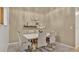 Dining area with a modern white table and six light-grey chairs at 1659 Rivers Edge Dr, Orlando, FL 32825