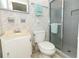 Bathroom with shower stall, toilet, and vanity at 2201 Sunderland Rd, Maitland, FL 32751