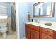 Bathroom with wood vanity and bathtub at 2201 Sunderland Rd, Maitland, FL 32751