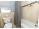 Bathroom with shower/tub combo and tile at 2201 Sunderland Rd, Maitland, FL 32751