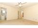 Bright bedroom with ceiling fan and carpet at 2201 Sunderland Rd, Maitland, FL 32751