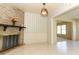 Bright dining area features a fireplace and view into the kitchen at 2201 Sunderland Rd, Maitland, FL 32751