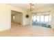 Dining room with access to a screened porch and chandelier at 2201 Sunderland Rd, Maitland, FL 32751