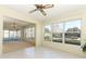 Dining area with tile floor, ceiling fan and view to backyard at 2201 Sunderland Rd, Maitland, FL 32751