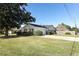 House exterior with brick facade and attached garage at 2201 Sunderland Rd, Maitland, FL 32751