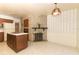 Kitchen with island, built-in oven, and ample cabinetry at 2201 Sunderland Rd, Maitland, FL 32751