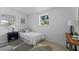 Bright bedroom with a double bed, wood-look floors, and a window at 2471 E 20Th St, Sanford, FL 32771