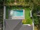 A bird's-eye view of the backyard, complete with a pool and pristine landscaping at 2510 Amherst Ave, Orlando, FL 32804