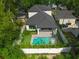 Aerial view of house featuring a sparkling pool and covered patio at 2510 Amherst Ave, Orlando, FL 32804