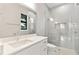 Modern bathroom with a glass-enclosed shower, vanity, and sleek fixtures at 2510 Amherst Ave, Orlando, FL 32804