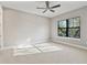 Neutral bedroom featuring carpet flooring, ceiling fan and natural light at 2510 Amherst Ave, Orlando, FL 32804
