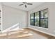 Airy bedroom with hardwood floors and a large window providing lots of natural light at 2510 Amherst Ave, Orlando, FL 32804