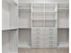 Spacious walk-in closet with built-in shelving and drawers for organization at 2510 Amherst Ave, Orlando, FL 32804