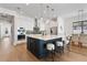 Spacious kitchen with modern appliances, a kitchen island and adjacent dining area at 2510 Amherst Ave, Orlando, FL 32804